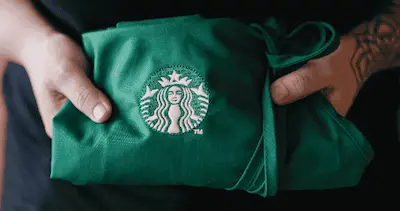 Starbucks barista apron showing brand engagement in employee content